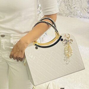 Neiman Marcus Shiny White Patent Leather Floral Charm Handbag